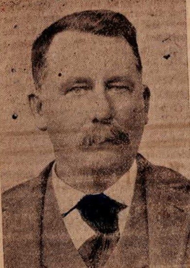 A newspaper portrait of Joseph Nathaniel Hood with a mustache, suit, and vest