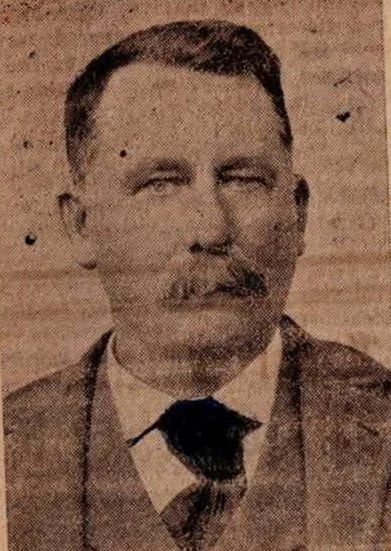 A newspaper portrait of Joseph Nathaniel Hood with a mustache and suit