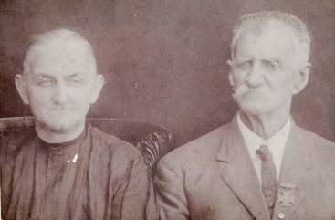 A seated portrait of Sarah and Martin Tyler Ledbetter
