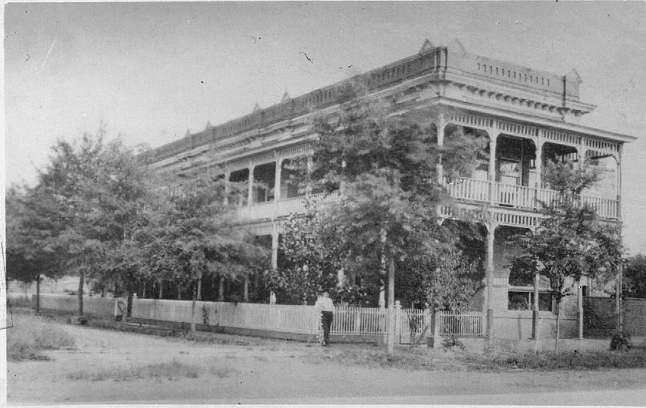 The ornate two-story Bank of Piedmont building with wraparound galleries
